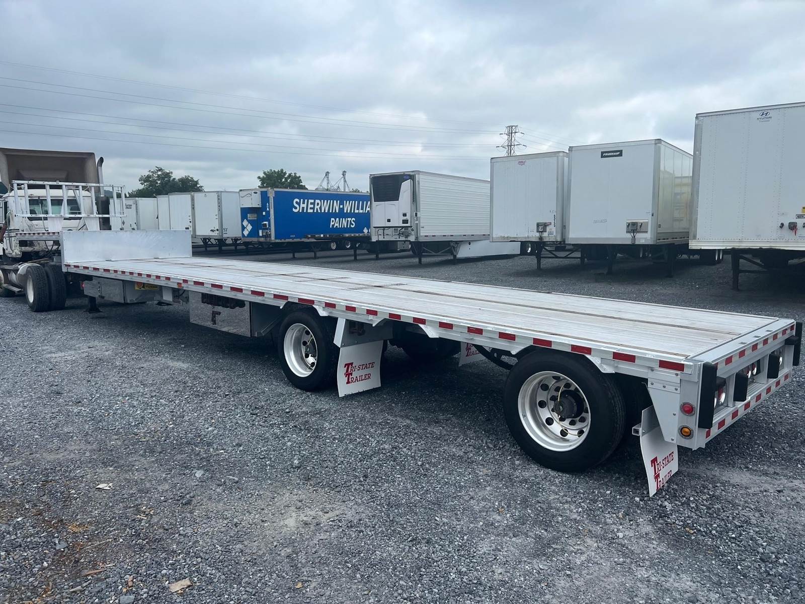 The Ultimate Solution in Freight Transportation - The Reitnouer DropMiser Aluminum Drop Deck Trailer